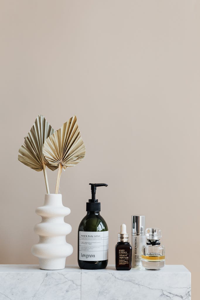 Daily Blog shelf featuring skincare bottles and decorative beige vase.