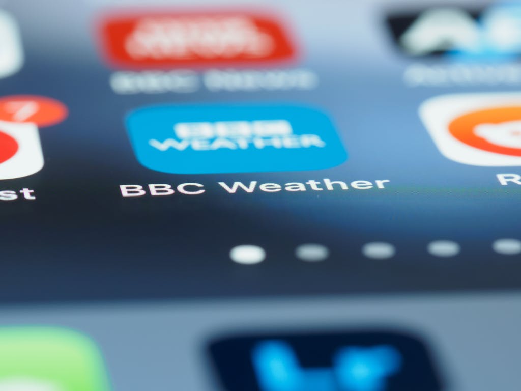 99racha Detailed view of BBC Weather application icon on a smartphone screen.