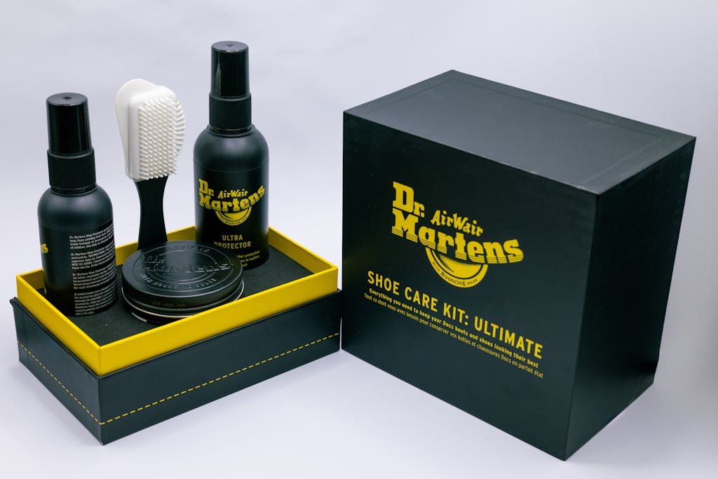 Kidlings Shoes Ultimate Dr. Martens shoe care kit including protector, brush, and wax for leather maintenance.