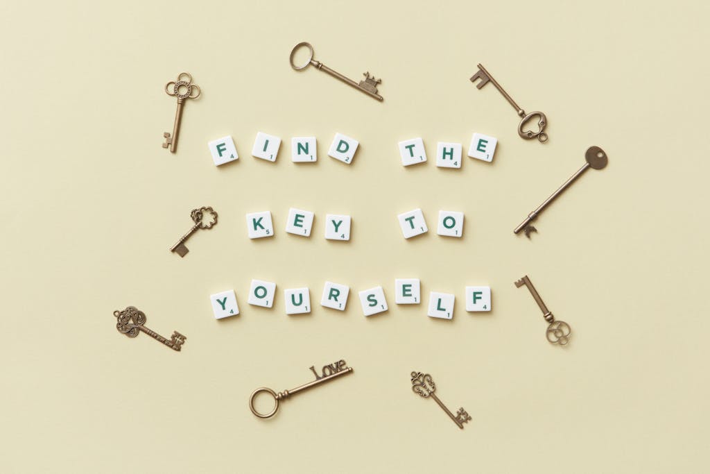 Fetid Key OSRS Creative arrangement of vintage keys and motivational text 'Find the key to yourself'.